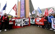 Trade unions protest against the Omnibus deregulation drive outside the headquarters of the European Commission